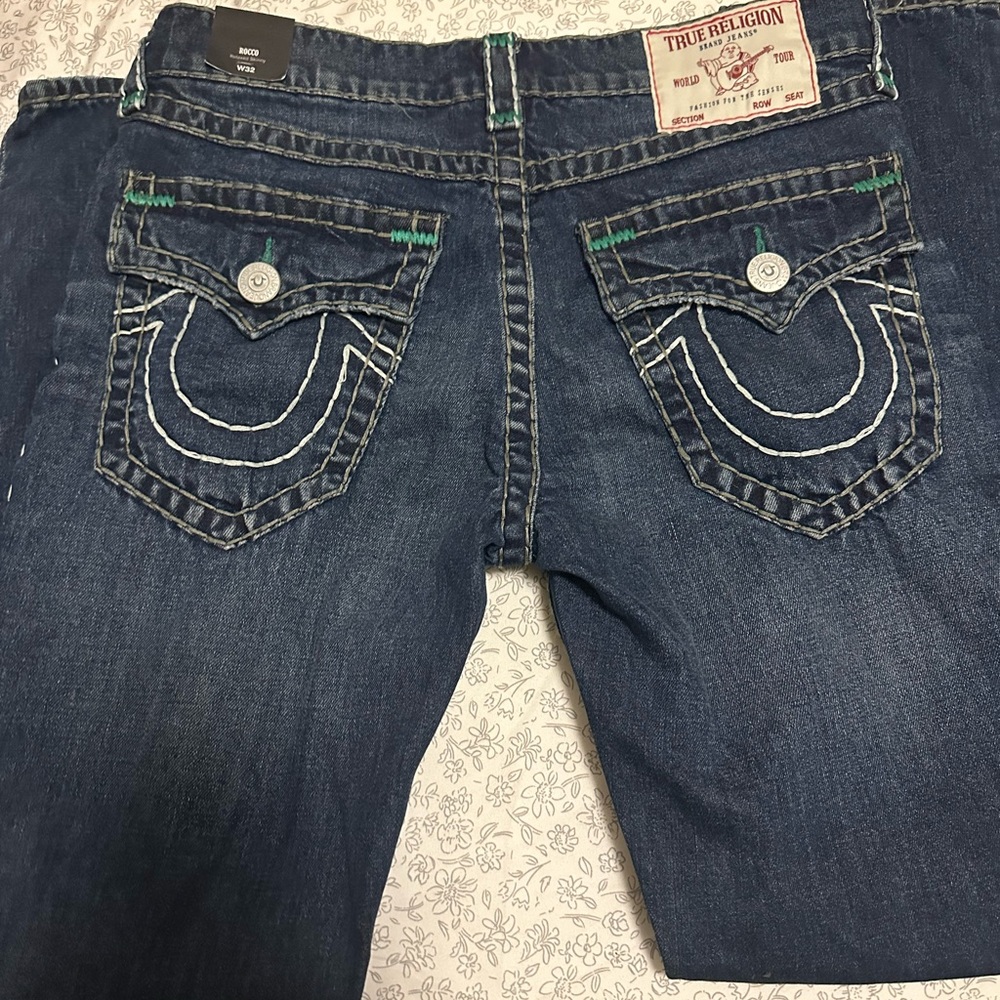 True religion jeans with white and green stitching